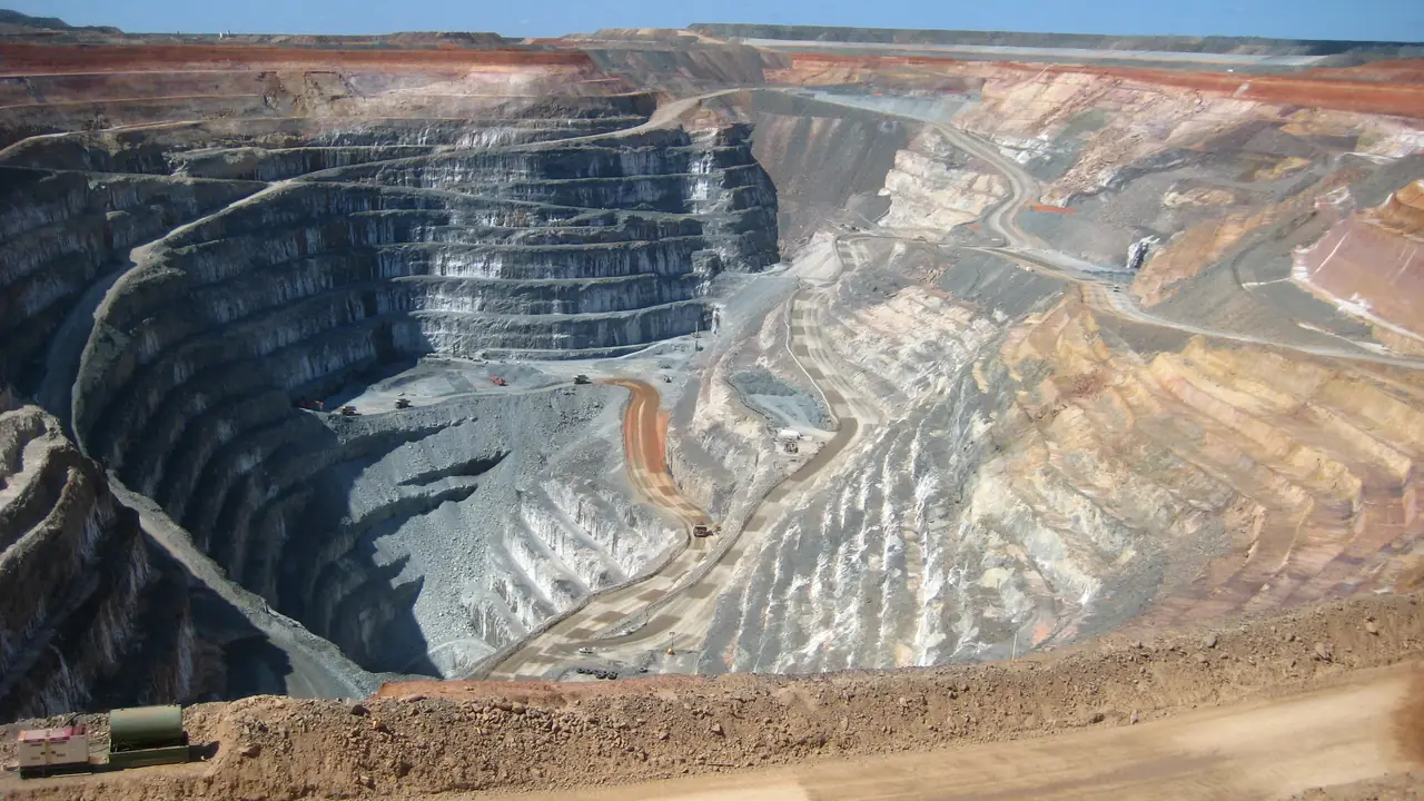 Open-pit gold mine with terraced benches