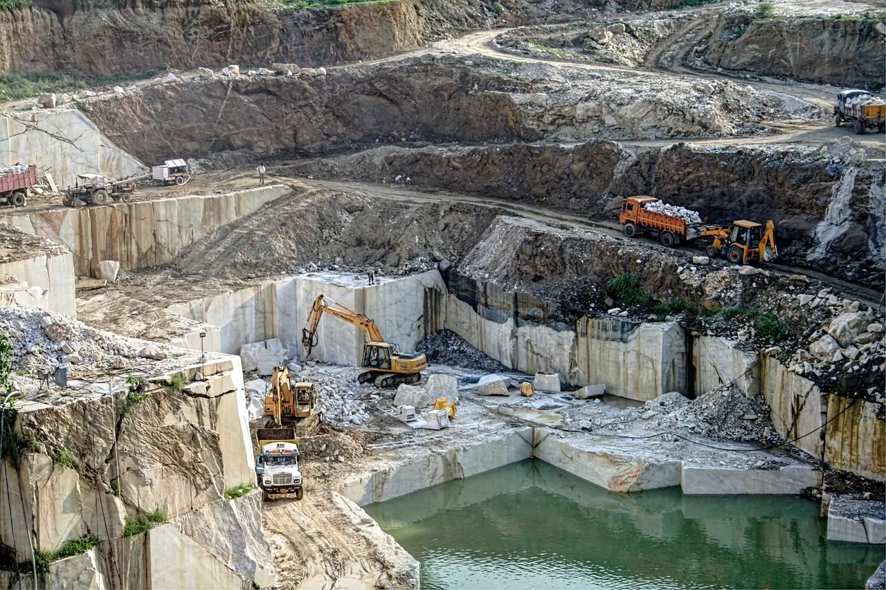 Terraced marble quarry with excavators, India
